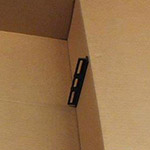 Patented cardboard boxes for the shipment of clothing in a horizontal position: greater safety for the garments, lower shipping costs
